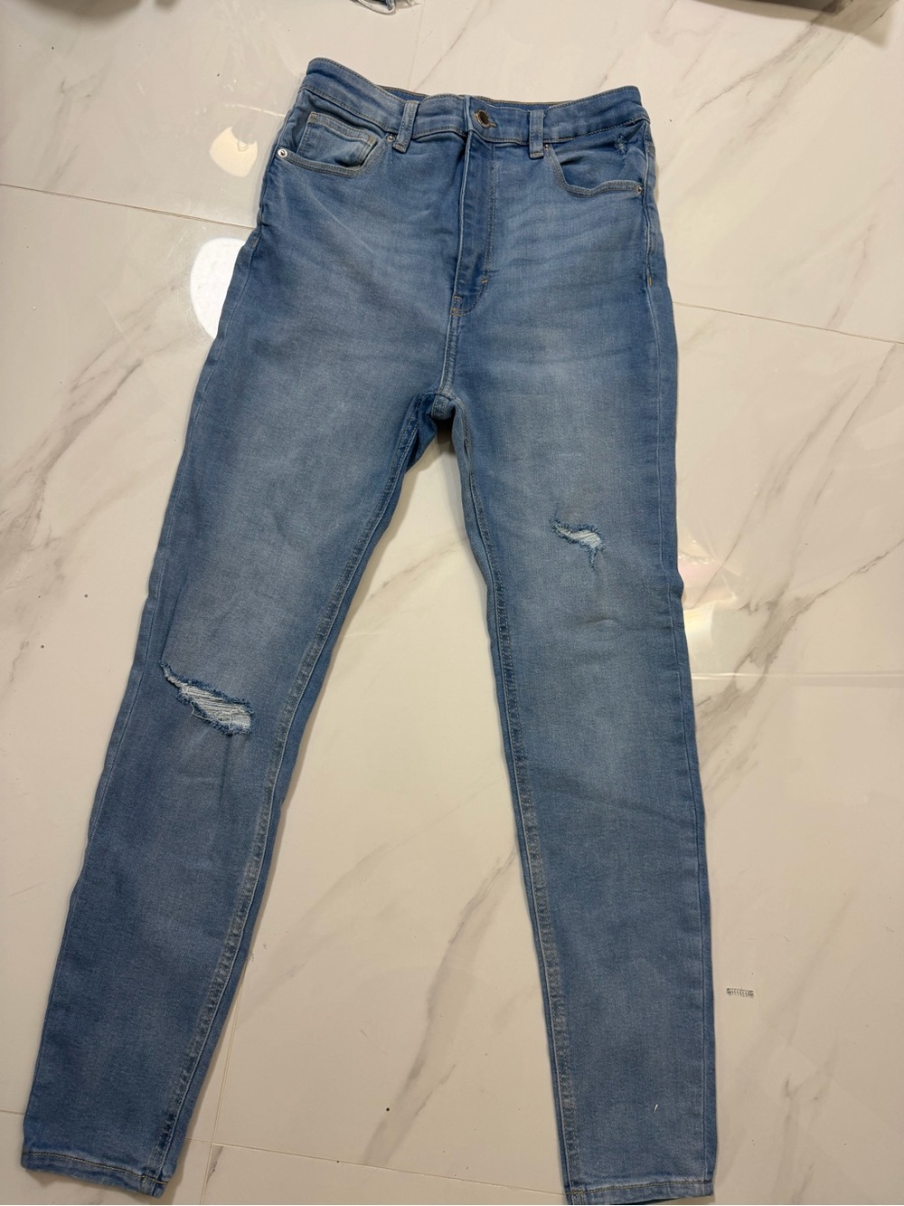 Light Wash Skinny Jeans with Subtle Distressing